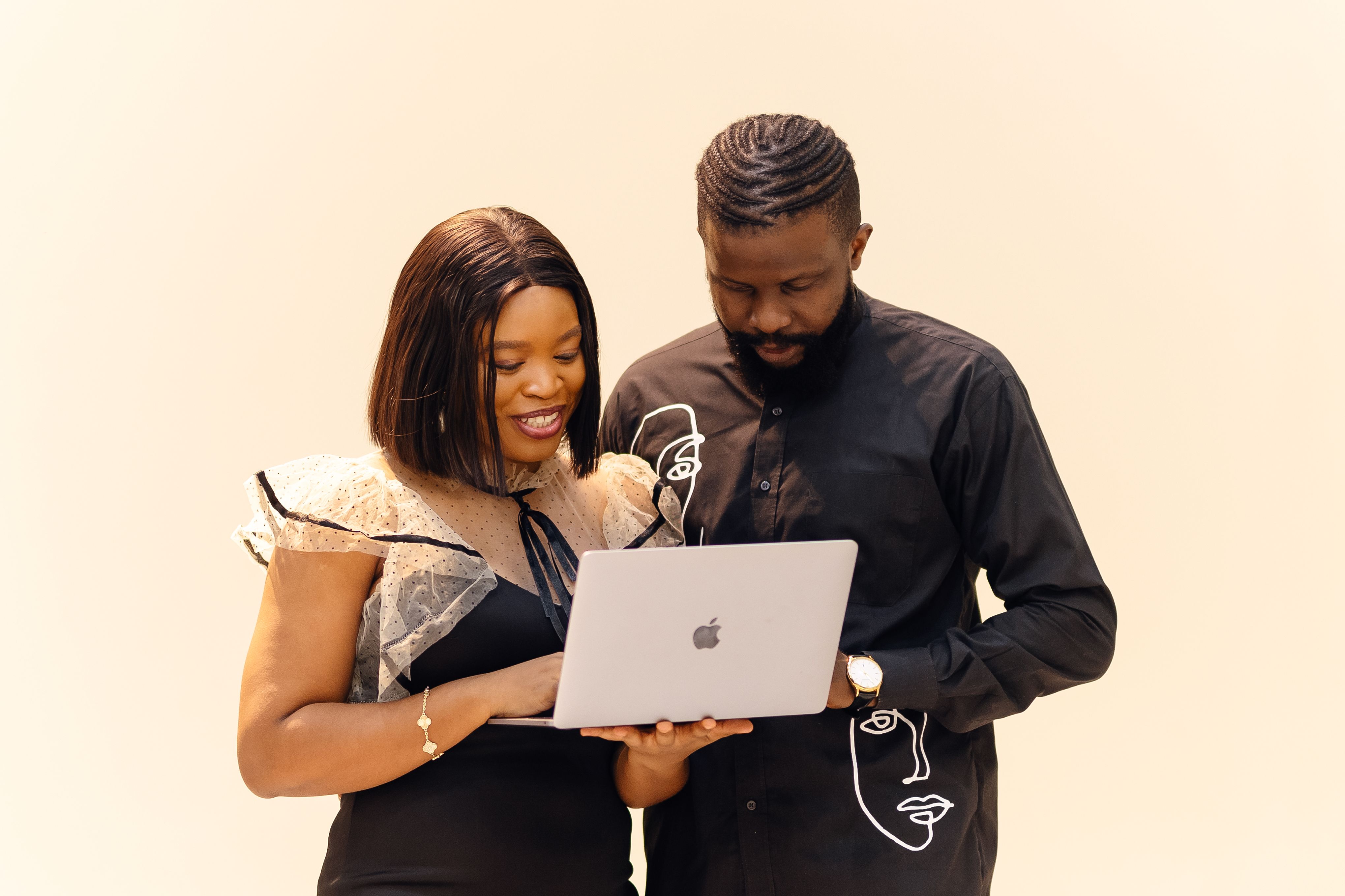 African colleagues reviewing work together in a Lagos office